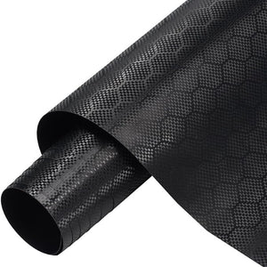 Carbon fiber vinyl car wrap with black honeycomb effect.